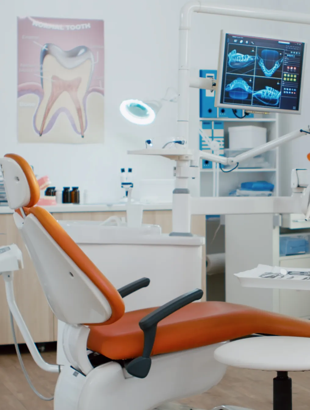 Dental chair and screen in a clinic
