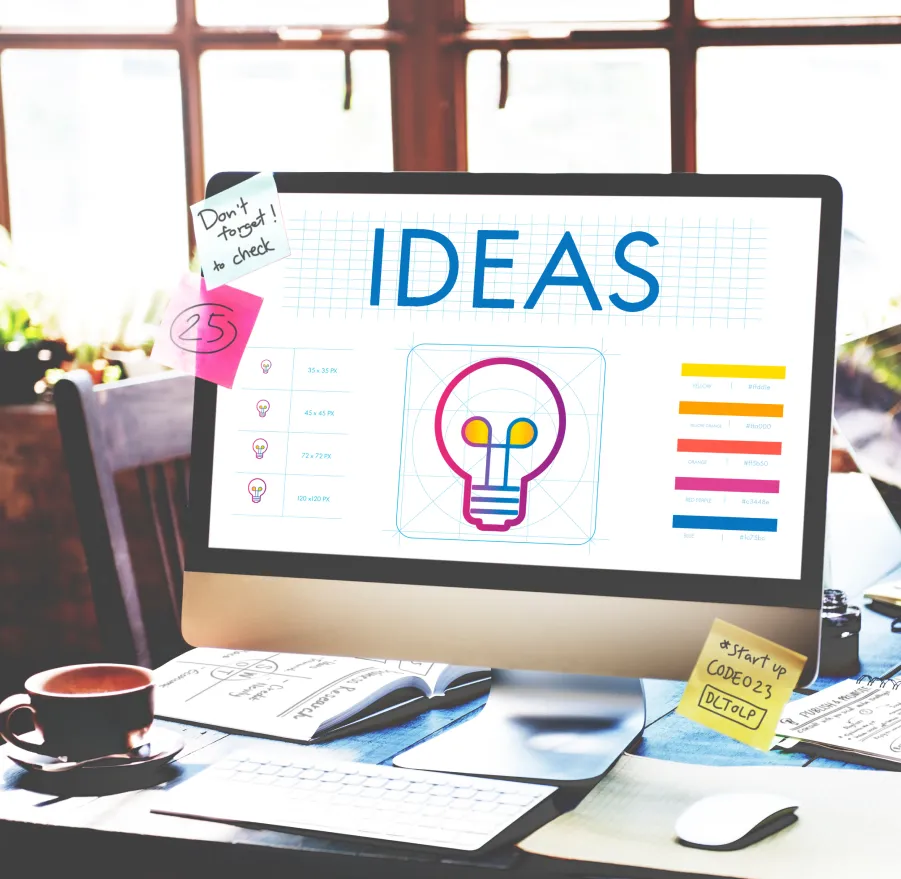 Desk with a creative board labeled 'IDEAS'